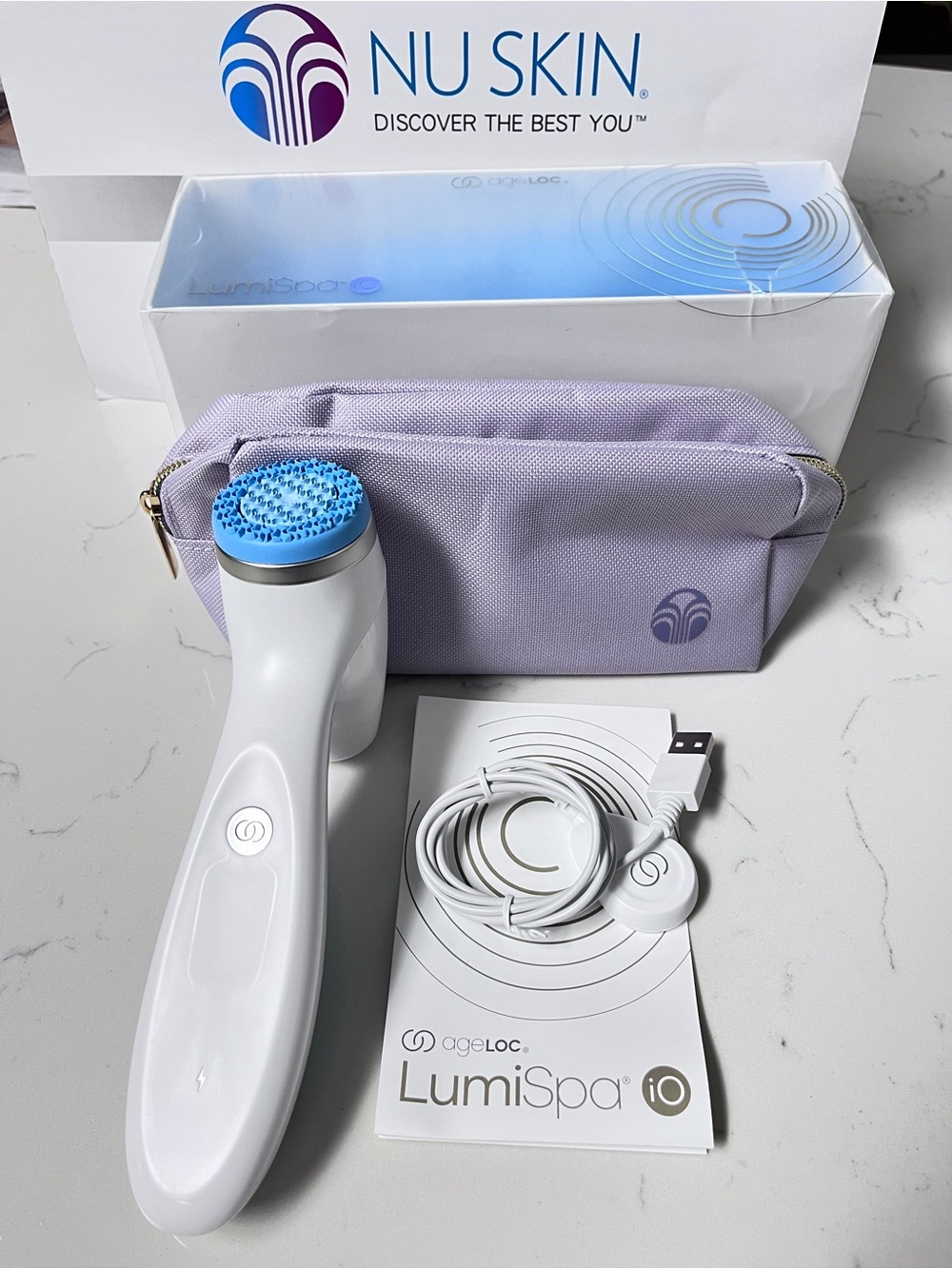 Nu Skin ageLOC LumiSpa iO Facial Cleansing Device in White with Lavender Pouch